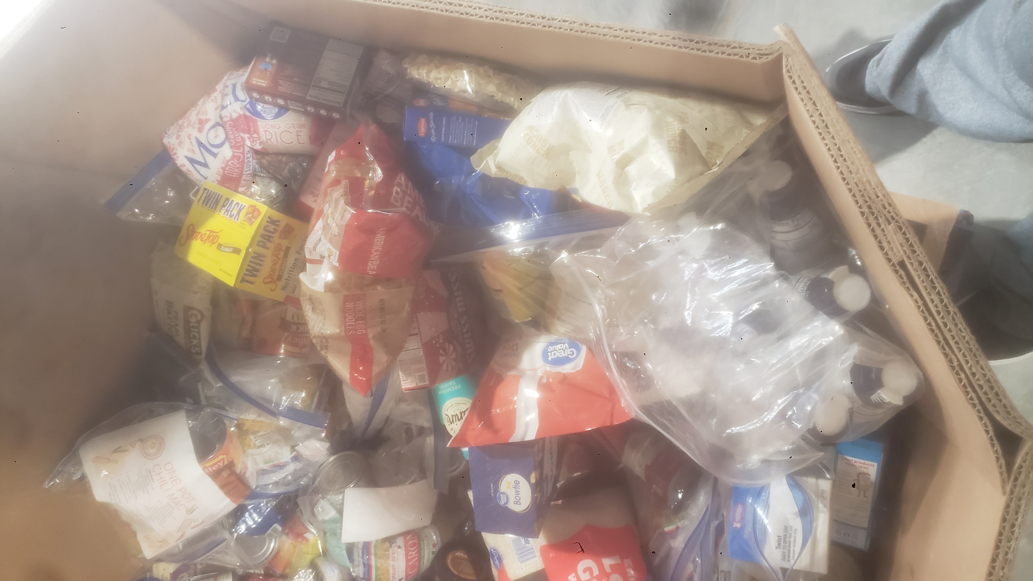 Cardboard container of different foods.